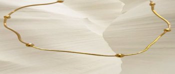 Collar Aura de acero dorado minimal con bolitas